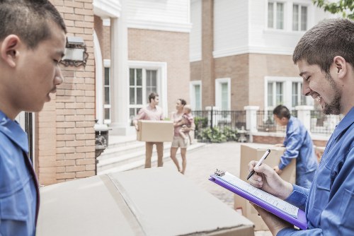 Furniture collection team handling bulky household items in Camden