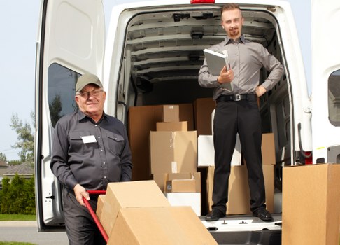 Removal van and moving team ready for a Camden house move