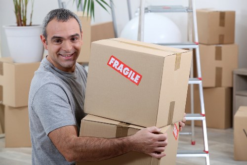 Removal van service documents and moving boxes for a UK booking process