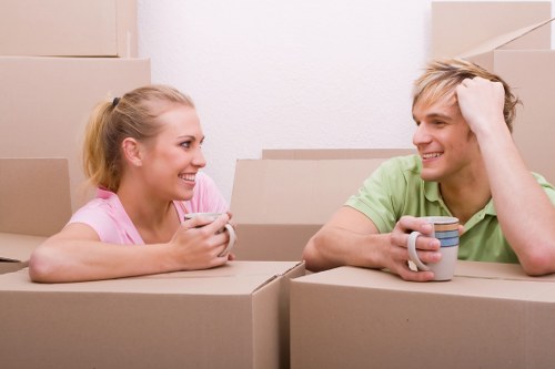 Removal van loading in Camden with boxes and furniture