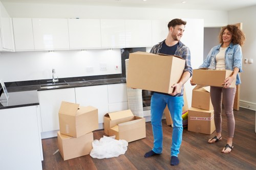 Organised moving boxes prepared for unpacking in a Camden home