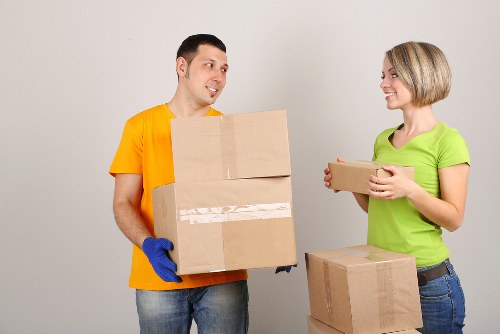 Loading furniture into a van for a flat move in Camden
