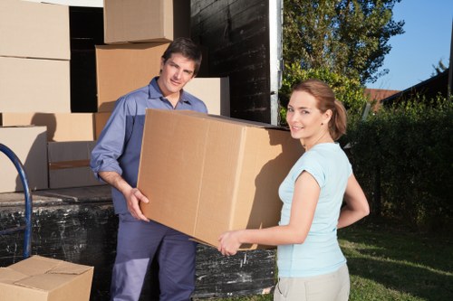 Packed boxes and furniture prepared for a move in Camden